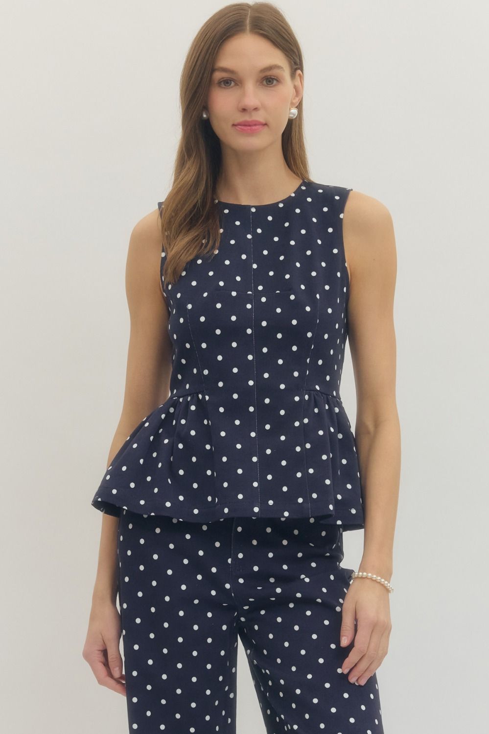 ENTRO Polka Dot Sleeveless Peplum Top In Navy