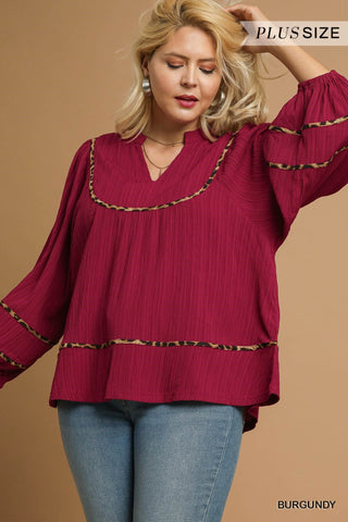 Umgee Textured Top With Animal Print Trim In Burgundy PLUS Size